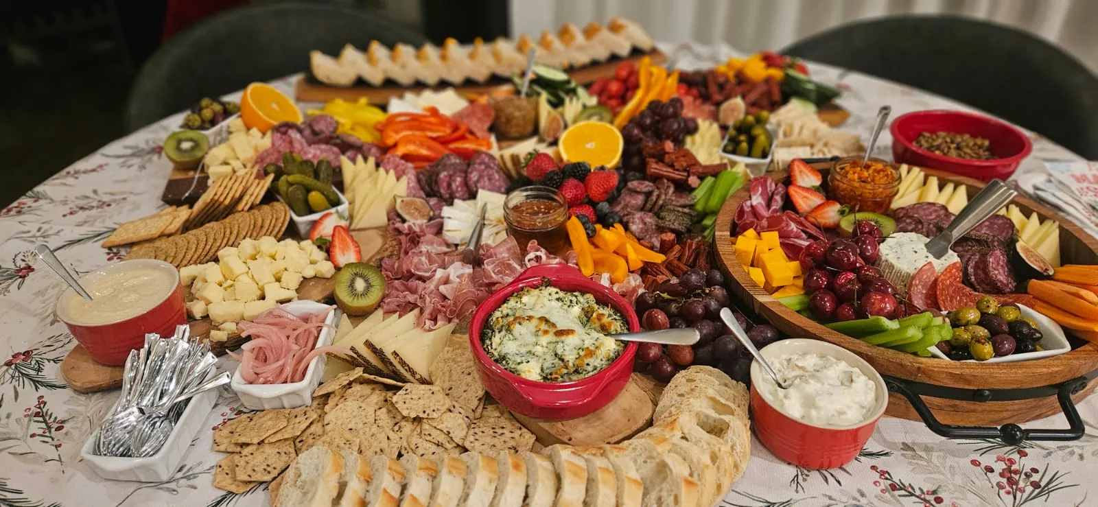 A Thanksgiving table set with warm dishes, bread and a grazing spread from Claire's Kitchen in Oakville