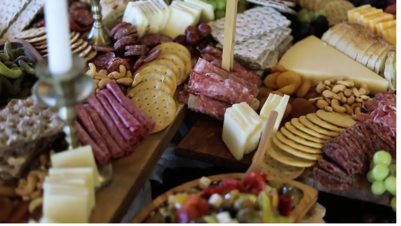 A grazing board of cured meats, cheeses and crackers styled for a private event
