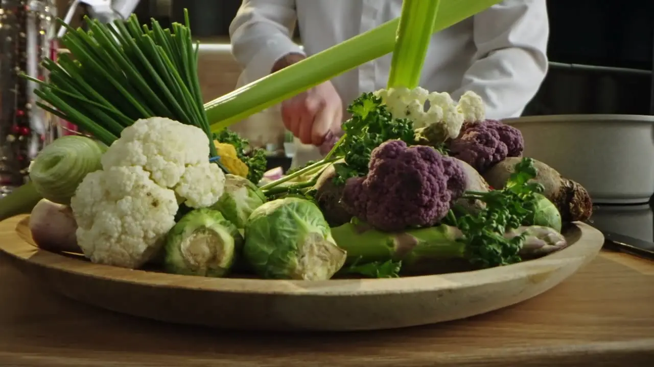 Fresh cauliflower, brussels sprouts and herbs being prepared for a Kitchener-Waterloo office lunch